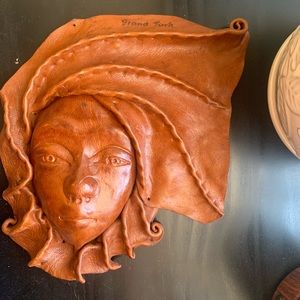 Tooled leather wall hanging woman